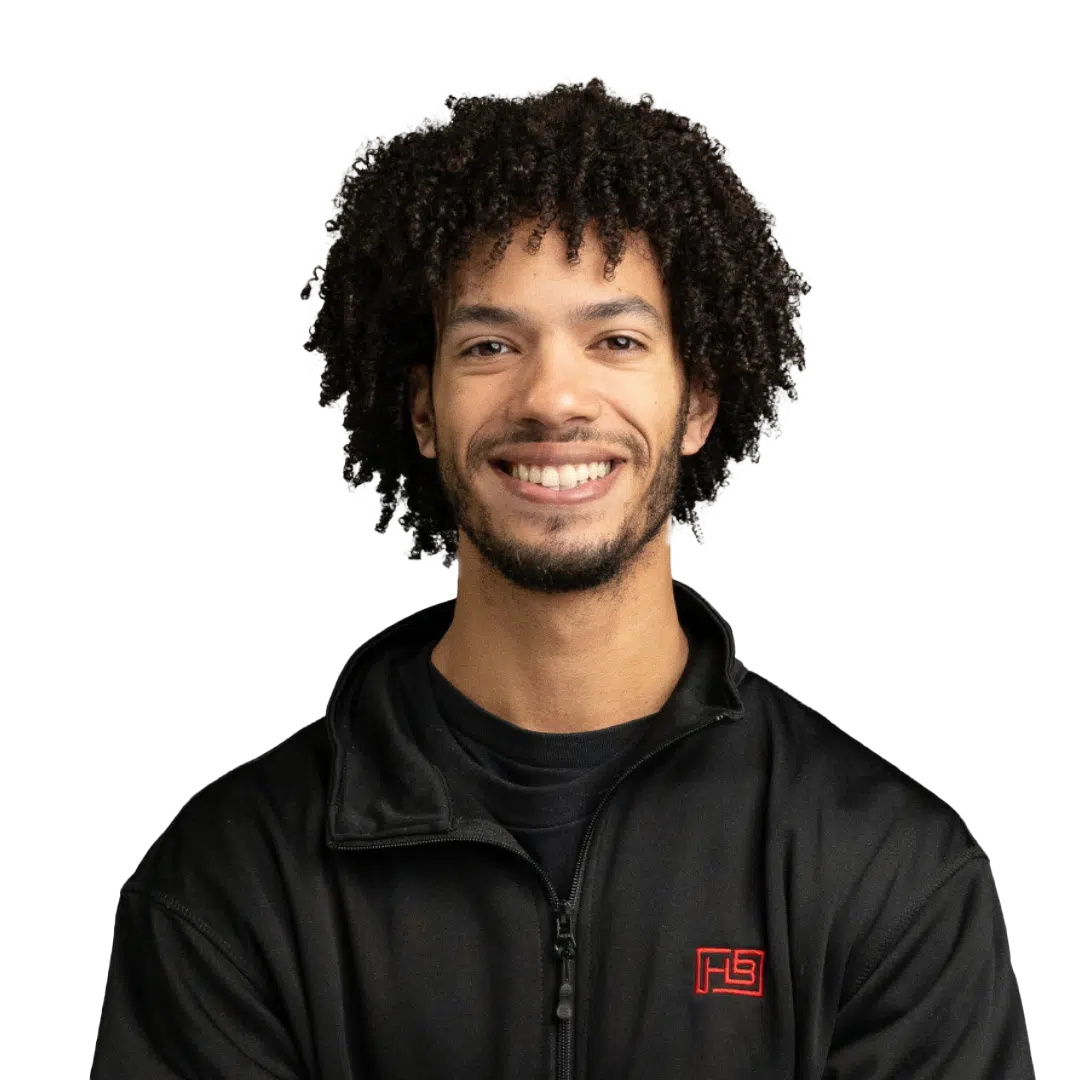 A Handy Bros. technician with a big smile, showcasing enthusiasm and dedication to providing excellent HVAC service.