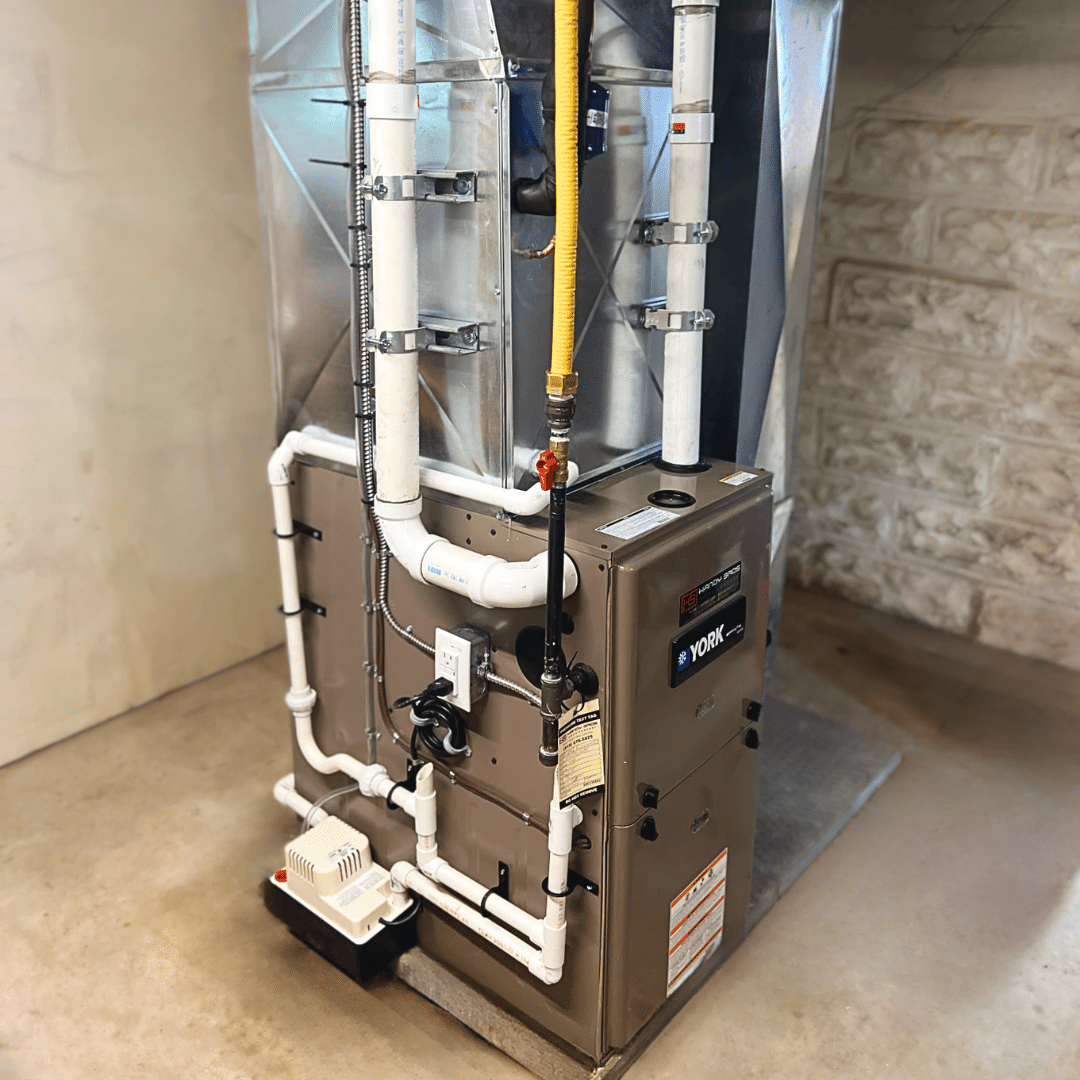 A perfectly installed furnace in a clean basement, showcasing professional workmanship and efficient home heating setup.