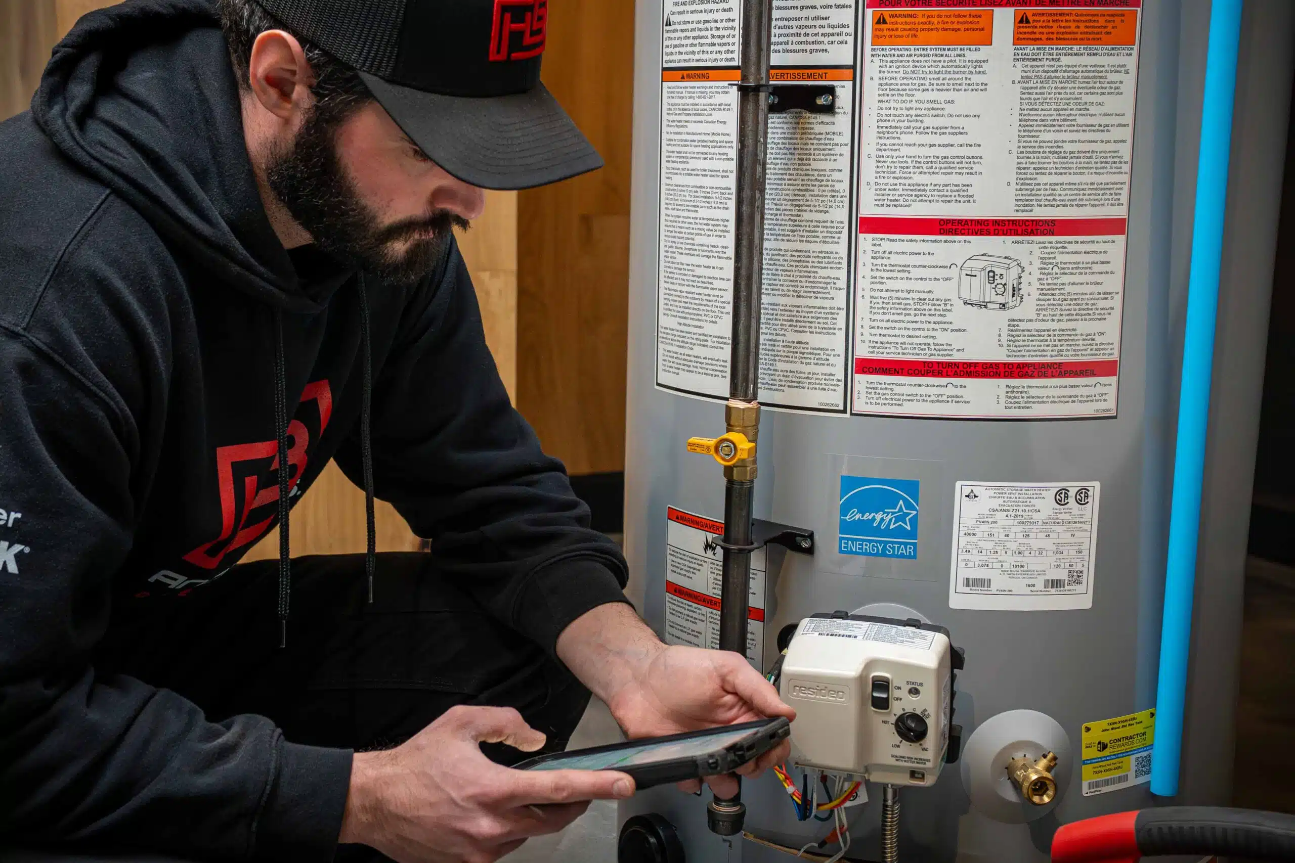 Water heater repair in progress as a technician ensures proper connections and safe operation.