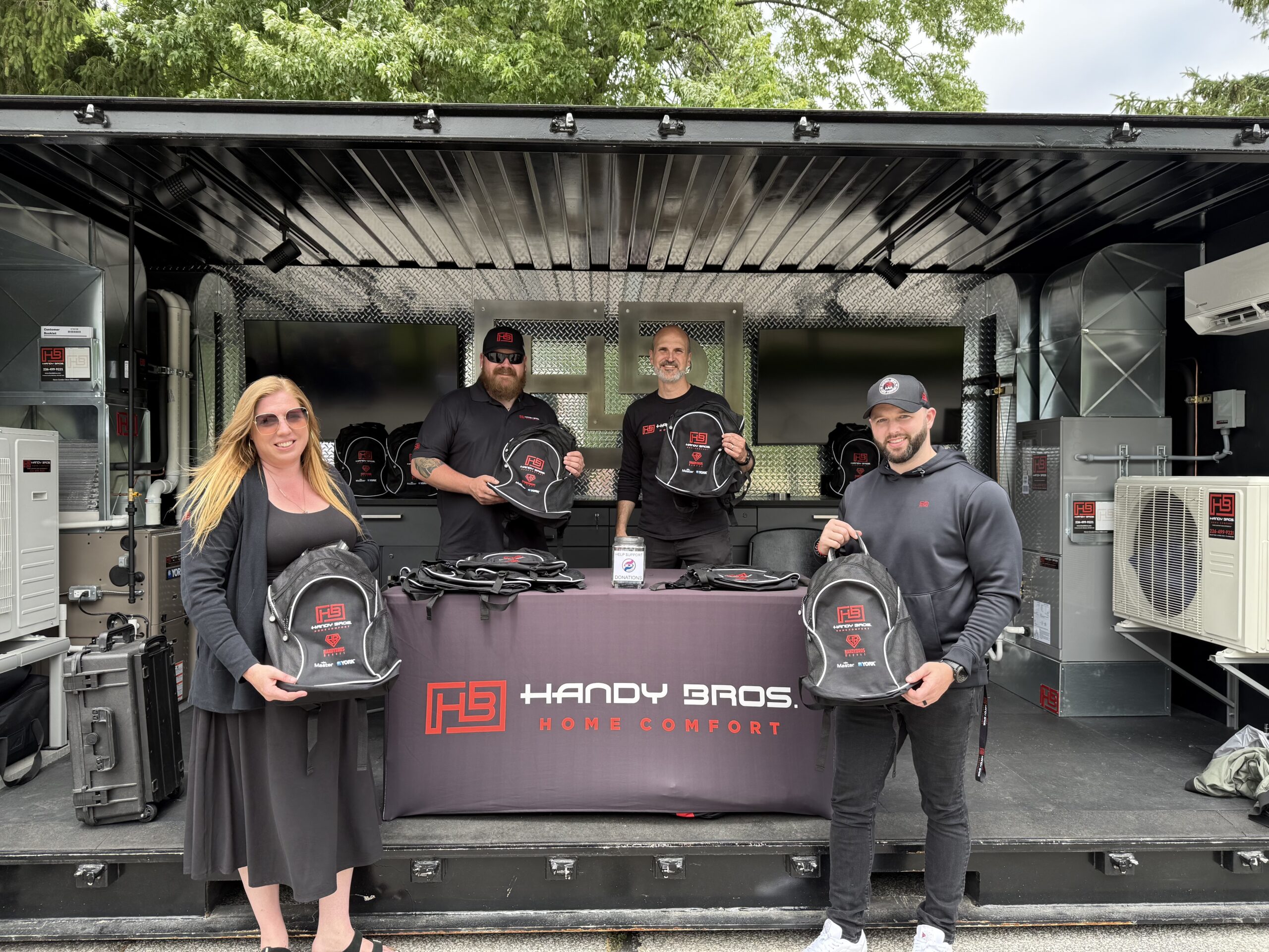 a group of people standing in front of an event