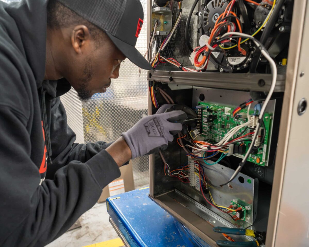 Handy Bros. Technician Prepping Furnace