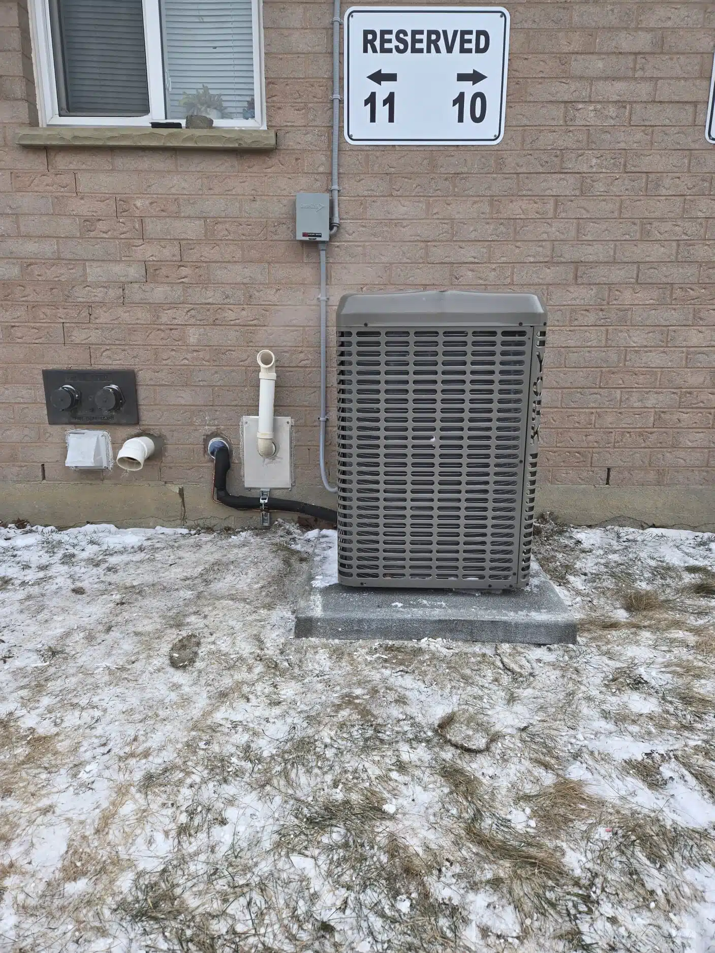 Air conditioner installation outside a home