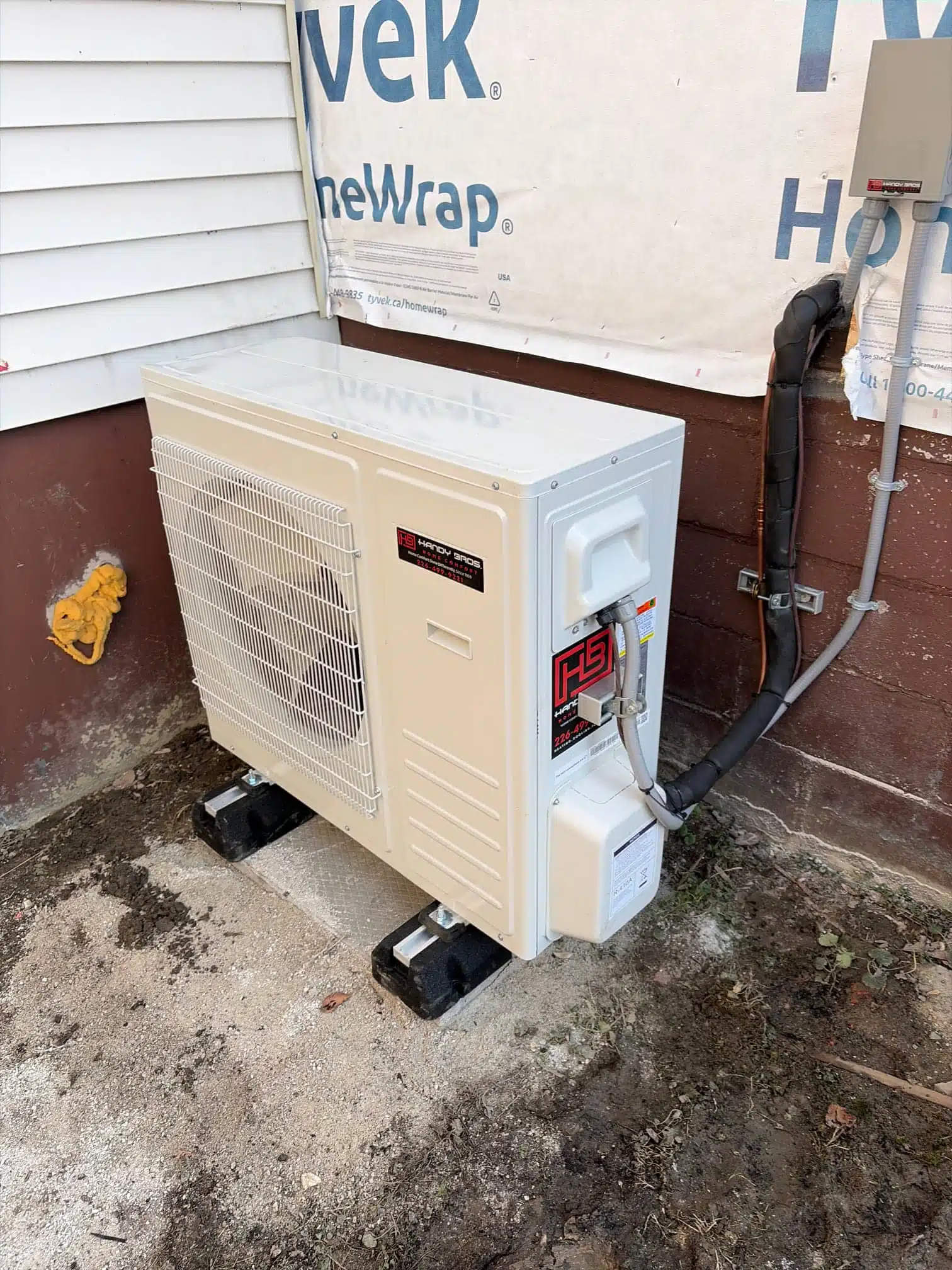 Heat pump unit installed outside a home